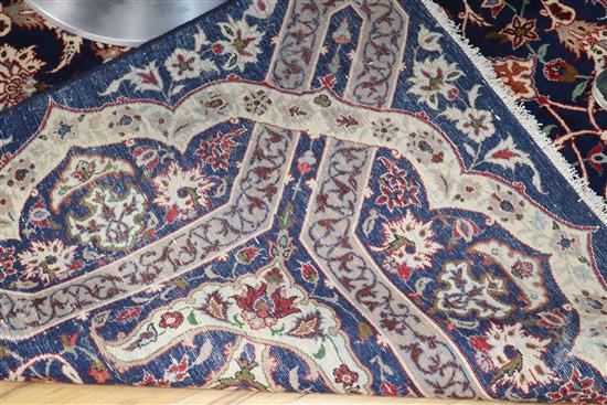 A Tabriz blue ground carpet, 410 x 272cm